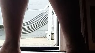 Mofo2121 takes off his cock pump in the courtyard