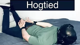 Selfbondage in a Hogtie while Hooded and Plugged
