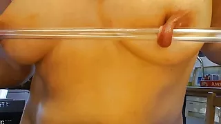 nippleringlover horny milf inserting 16mm tube through extreme stretched pierced nipples