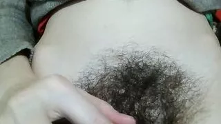 Hairy pussy aside, girl is showing her hair to her boyfriend to impress him.