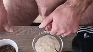 Cicci77 masturbates Pedro and makes him cum to make the yogurt breakfast with sperm and cornflakes