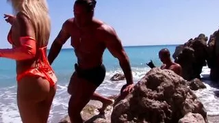 Small tits Shana Spirit receiving a facial on the beach