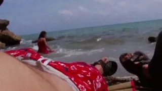 Brunette Shannaya Tweeks shared on the beach between two men