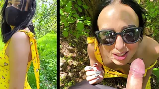 Cumshot on the face in glasses of an unfamiliar beauty in a dress