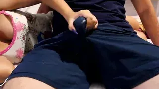 Handjob over shorts, cum through clothes