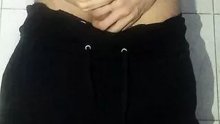 Young boy went to the bathroom, lowered his sweatpants and continued masturbating his big and thick shaved dick