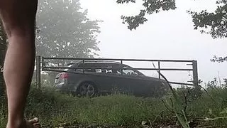Naked in a roadside field