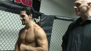 Babe wrestles with dick on mat!