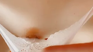 Petite girl masturbating in panties. Transparent panties, rubbing her hairy pussy she gets orgasm. Red and tight