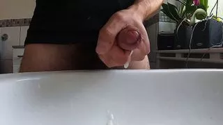Wanking hairy cock in bathroom and cumming