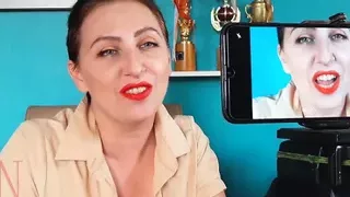 Red lipstick kissing and teasing by Regina Noir.