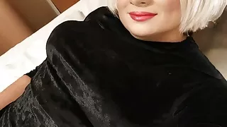 Crossdresser puts mega long dildo in ass under velvet dress