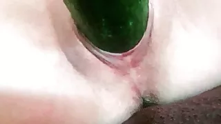 Cunt filled with cucumber
