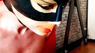 Sperm games.  Dominatrix Nika poured a condom with sperm on the slave's head. Cum in condom.