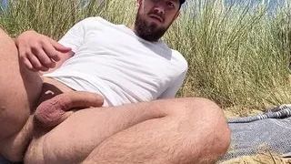 Beach Jerk off Pt 2, bearded guy cums on beach.