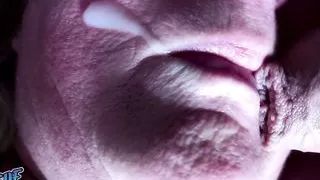 Her mouth gets filled with cum and she swallows