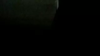 I wore a condom in my bed while naked in black shaded room