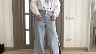 Sissy in wide leg palazzo bootcut flared jeans and white hoodie on high heels ready for the evening dancing and cum