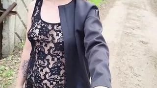 Sexy girl walking in transparent lace dress