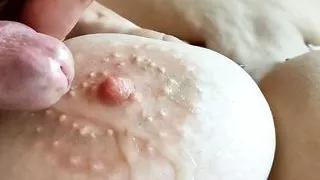 Stepmom gets her breasts sprayed with cum.2