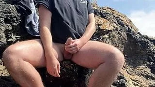 Outdoor cum on beach cliffs.