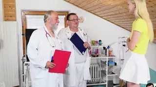 20-year-old sexy blonde girl Ariela Donovan gets her aroused pussy examined by 2 old gynecologists