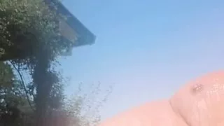 Drinking by the pool on a windy day