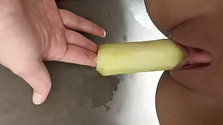 Cucumber in a wet cunt