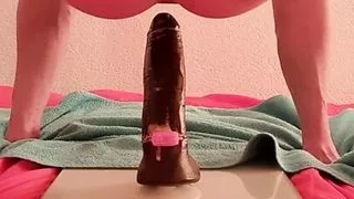 TIMMYBOY92 rides on Doc Johnson's ultra-realistic black dildo and enjoys it