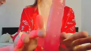 Slutty geisha sticks a dildo down her throat and then fucks herself with it
