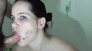 Hot bitch sucks dick and gets cum on her face. Sex service in the bathroom