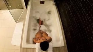 Jezebelle Bond films herself taking a bath