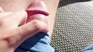 Massaging big cock bulge through pants in the garden