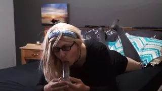 Sucking on a dildo