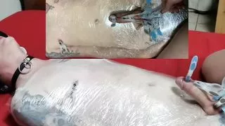 Mistress wraps her slave in clingwrap