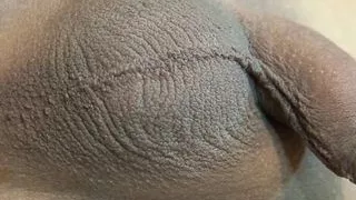 Black haired Thai tranny plays only on the couch