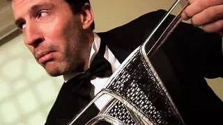 Ebony Goddess stimulates Tony's cock with her two big tits