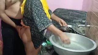 Stepsister has sex with stepbrother in the kitchen