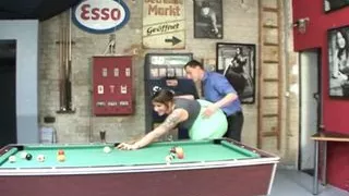 Busty slut rides a solid cock on the pool table
