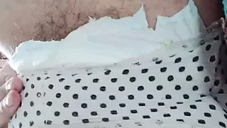 Huge pad in white panties.