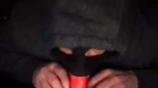 masked cuckold sucking a dildo