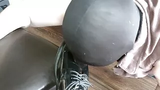 Slave licks shoes clean