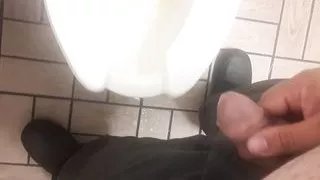 Peeing and then stroking it a little before going back to work