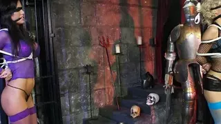 Blonde and brunette sex slaves get their hot asses slapped in a dungeon