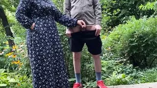 Mommy MILF helps her stepson pee outside and pee standing herself