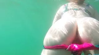 Underwater masturbation by saggy titted milf