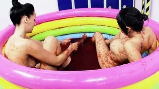 A pool of jello makes the British lesbians with big boobs want to wrestle in it