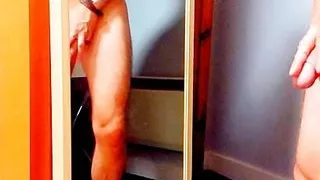 Handjob in front of the mirror
