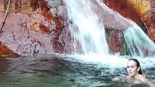 Big titties & small waste April Sparx playing on natural rock slides