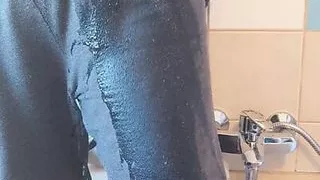 Young man pisses in his pants